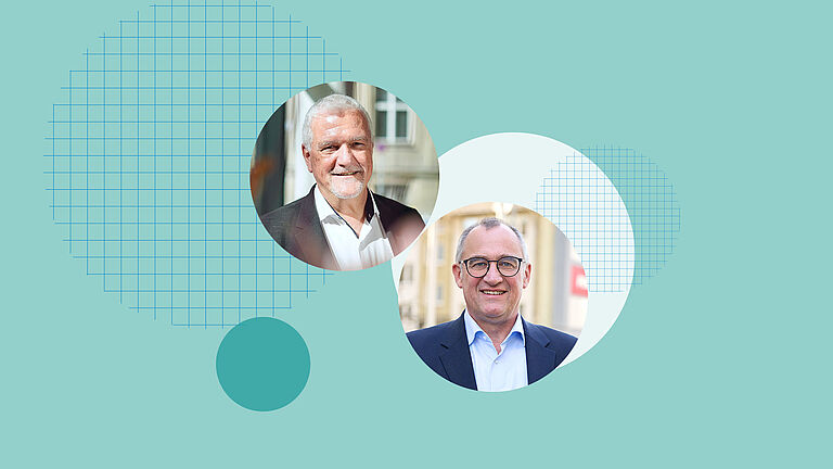 Zwei Herren in Anzügen – Porträtaufnahme – schauen in die Kamera